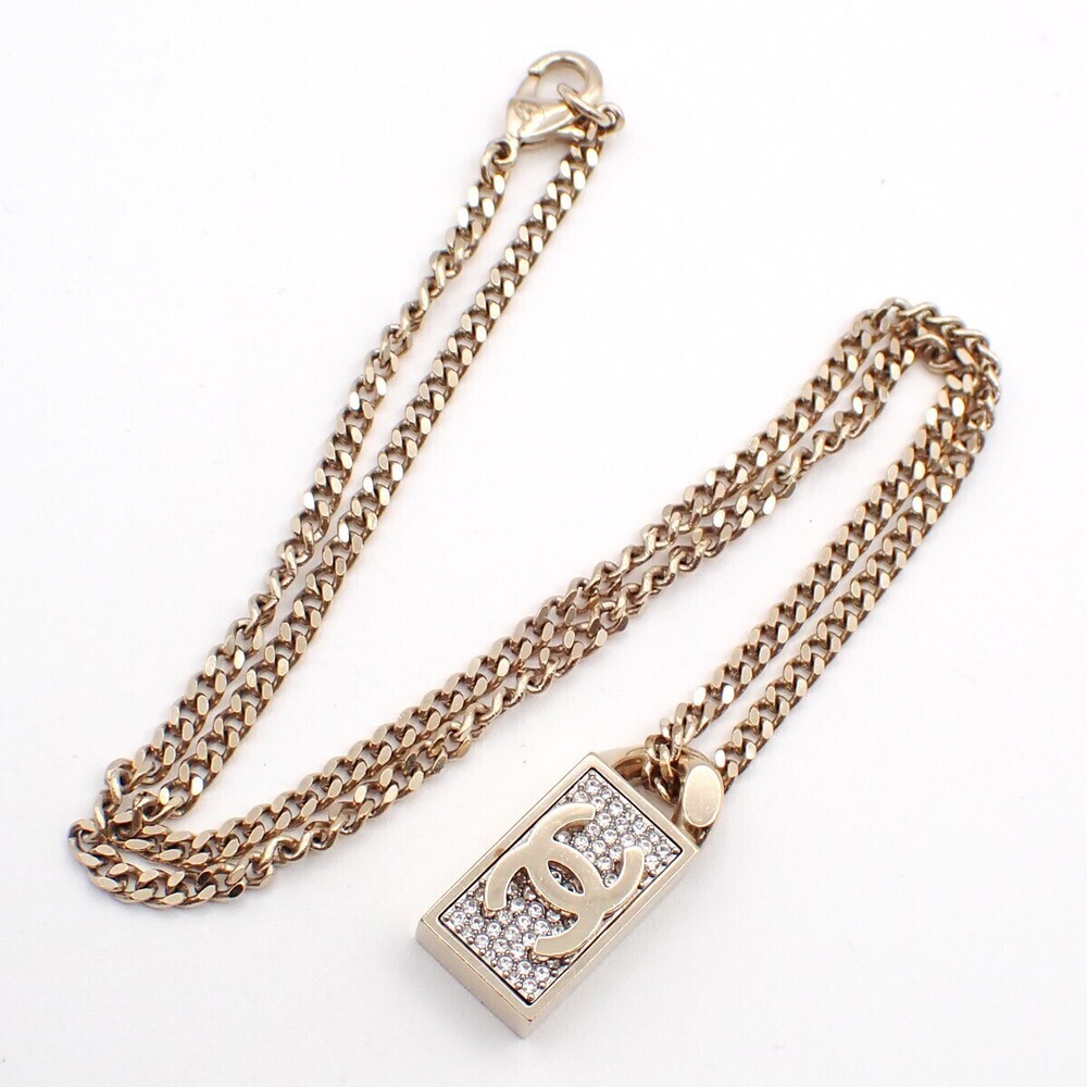 Chanel CC Dog Tag Pendant Metal with Crystals